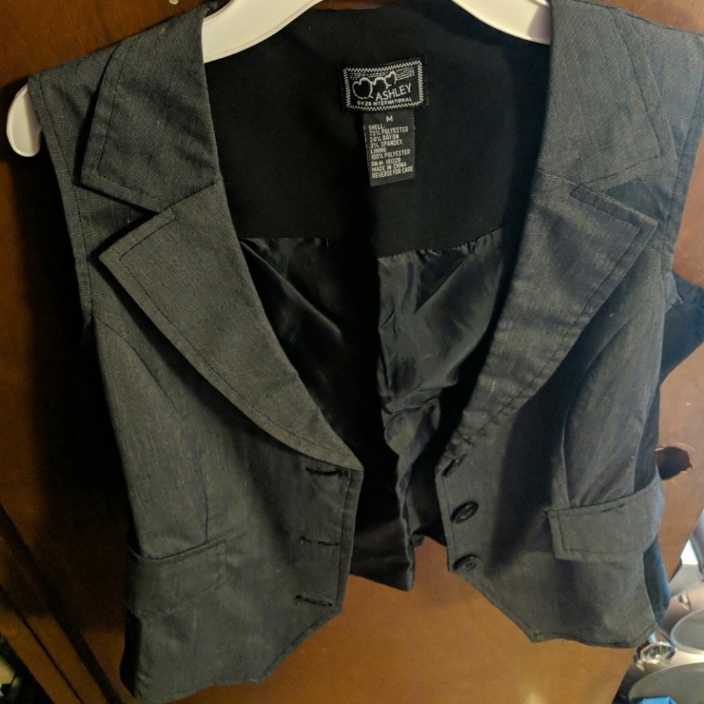 Black and grey vest